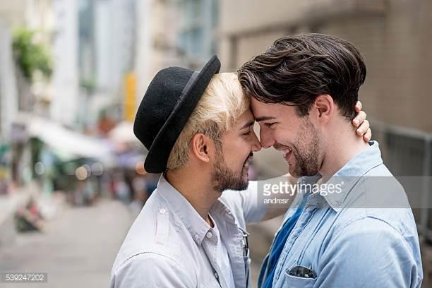 Is it acceptable for 2 gay men to kiss in public?