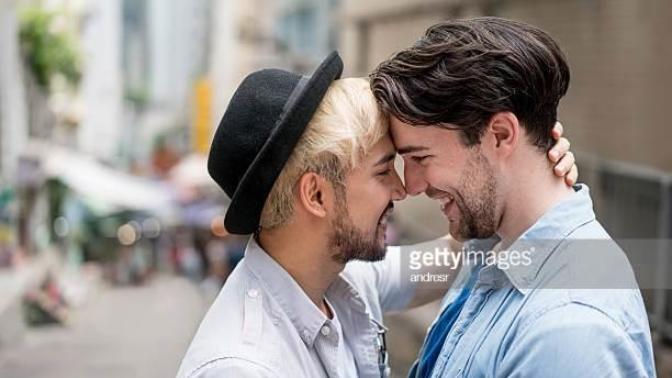 Is it acceptable for 2 gay men to kiss in public?