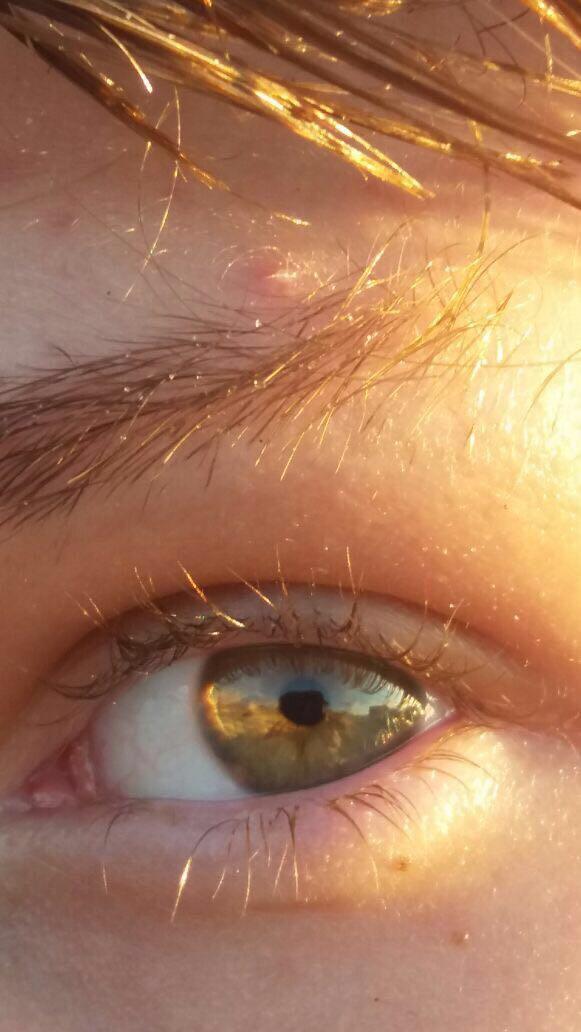 What is this eye color? Hazel or green?