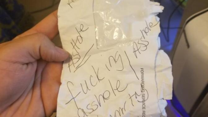Has anyone ever left a note in your car in a shopping center parking lot, cussing and threatening to press charges against you?