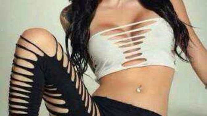 How she looks beautiful or not... And how is her dressing style?