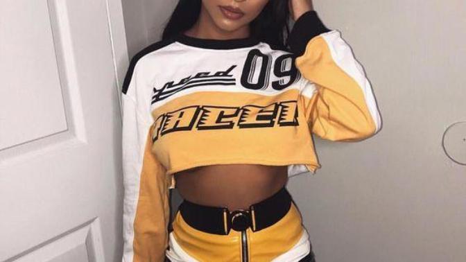 Which Outfit Looks Better For Attending A Sports Car Racing Event?