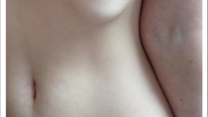 Why do some girls have vertical navel?