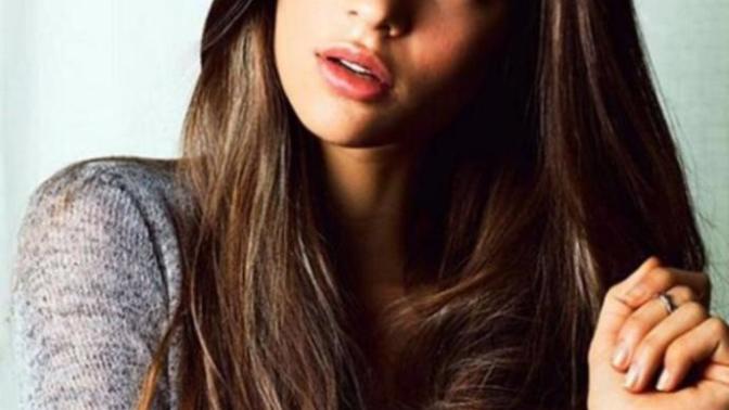 Guys, is straight hair or curly hair more attractive on a woman?