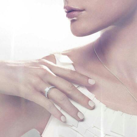 My wife bought me for gift the same engagement ring she wears. Should a man wear it?