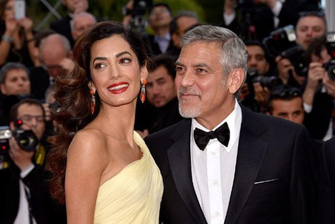 George 53 and Amal 36.