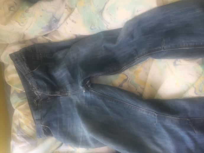 I am 20, I am 5’5.. I have jeans that are 13 years old that fit me. what should I do? should I get rid of them? two of the pictures are kid jeans?