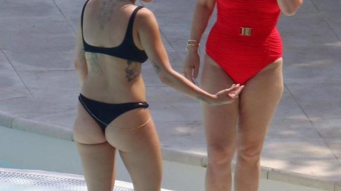 Is Rita Ora's bikini appropriate to wear around family? Would you wear a similar one round your parents or not? Guys would you mind if your girlfriend did?