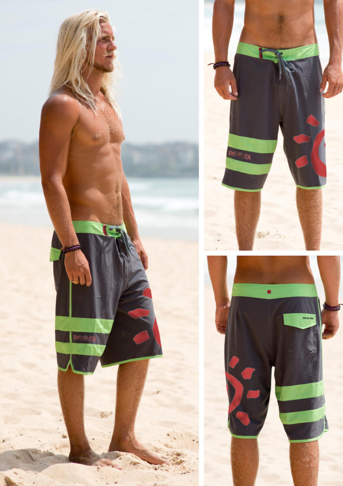Enormous shorts! Past his knees!