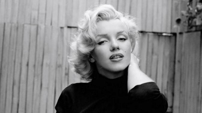 What makes a woman appear more feminine and attractive?