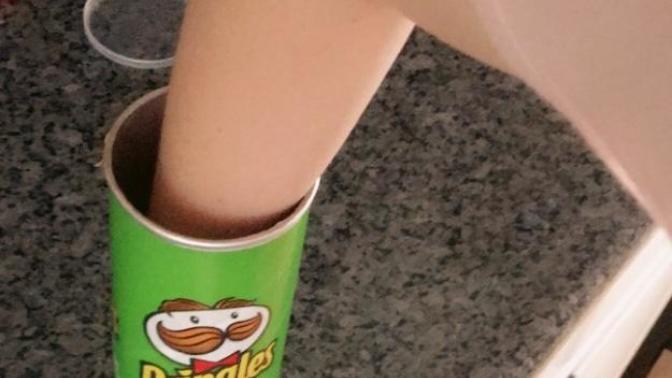 Can you get your hand to the bottom of a Pringles can?