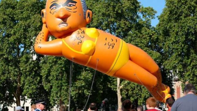 Sadiq Khan bikini balloon: Londoners protested against Sadiq Khan by making a balloon of him wearing a yellow bikini, what is your reaction to this?