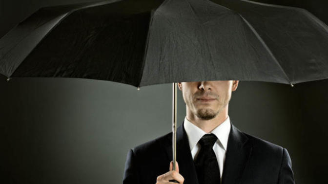Is it considered unmanly to use an umbrella or more girl like to use one?