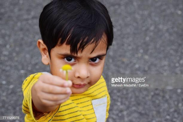 Girls, How would you feel if this toddler boy comes to you with a flower in his hand and hugs you?
