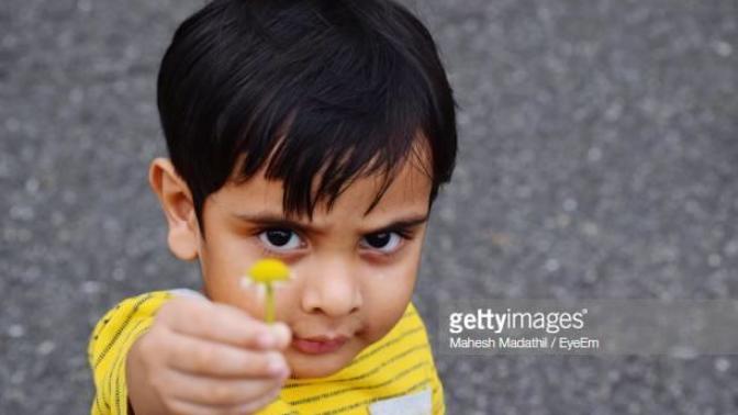 Girls, How would you feel if this toddler boy comes to you with a flower in his hand and hugs you?