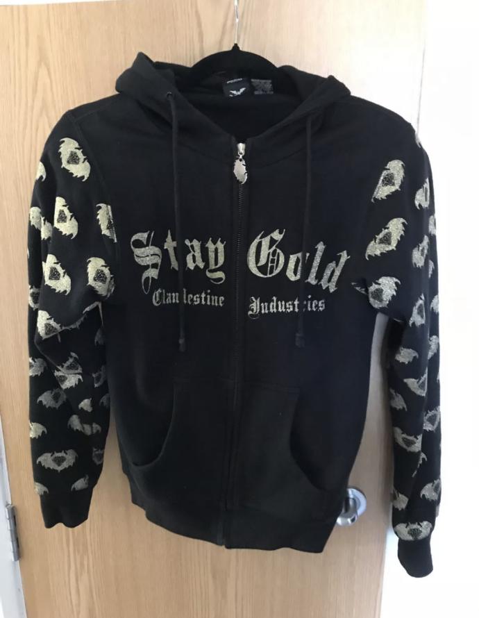 Do you like this black hoodie with gold glitter details?