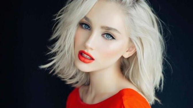 Is a woman beautiful only if she has white or light skin?