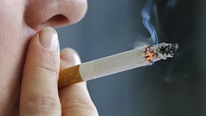 Why is my boyfriend forcing himself to smoke cigarettes with my dad? should I stop him?