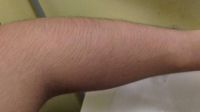 Should I shave my arm hair or would it look wierd?