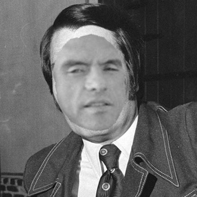 Do Tommy Wiseau and Jim Jones look alike?