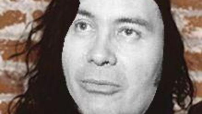 Do Tommy Wiseau and Jim Jones look alike?