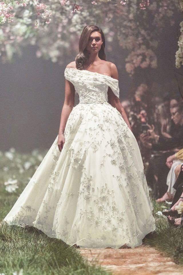 Which wedding dress is more WOW?