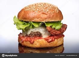 Hey GAGers, do you think vegetables (lettuce, tomatoes, onions, etc.) taste well on burgers or does it detract the flavor?