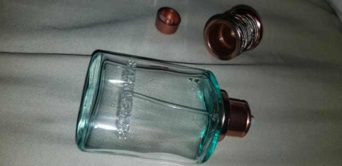 How do I open this glass perfume bottle to refill it with it breaking?