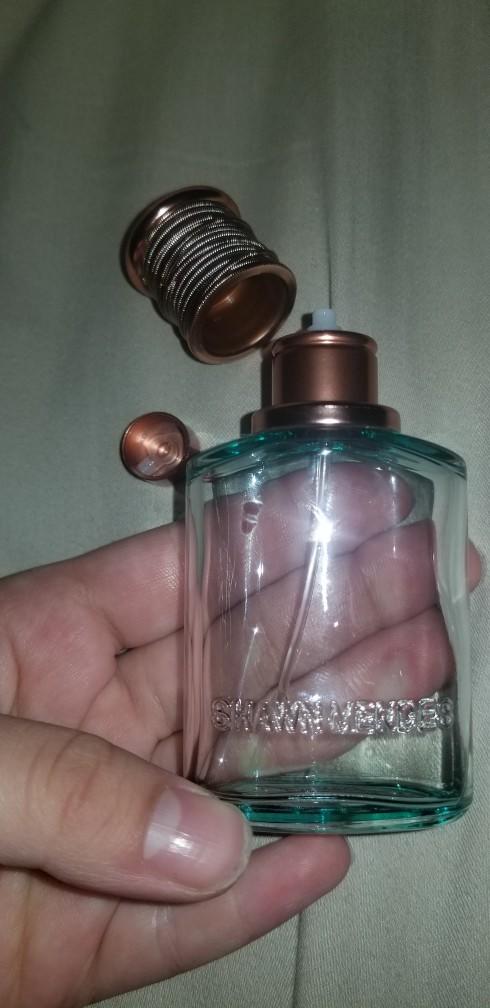 How do I open this glass perfume bottle to refill it with it breaking?