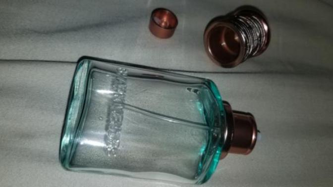 How do I open this glass perfume bottle to refill it with it breaking?