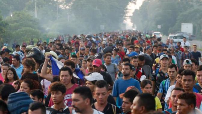 What's the agenda behind the migrant caravan heading towards the U. S. Southern border?