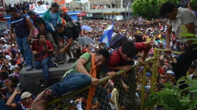 Mob Of Foreign Invaders Says To America "Let Us In ** OR ELSE! **" What Should We Do When These Marauders Get Here And Try To Break Into OUR Country?
