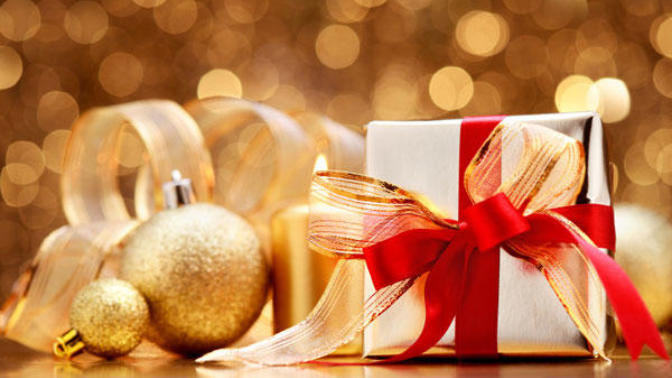 Do you add finishing touches when wrapping Christmas presents by adding ribbons or bows?