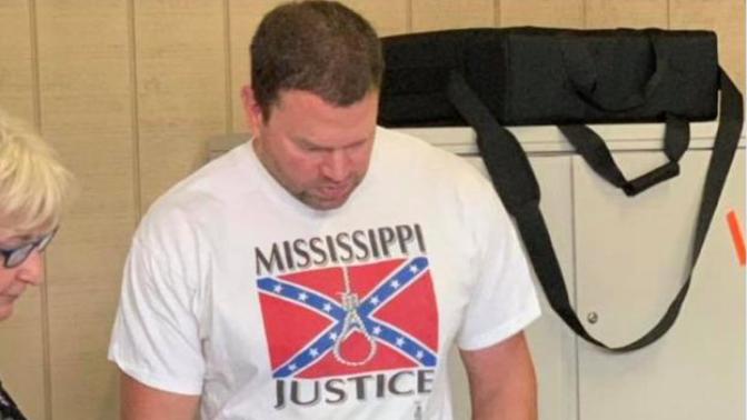 Man fired from his nursing job after wearing a racist shirt to the election polls. Should he have been fired?