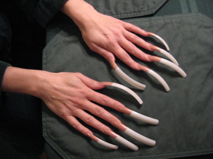 What’s more attractive on a girl short nails or long nails?