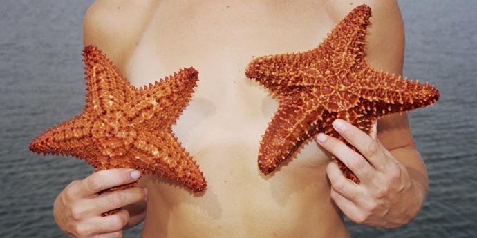 My bikini top blew off into the ocean. I went in the ocean and covered my breasts with the water. What would you do if u had to get out?