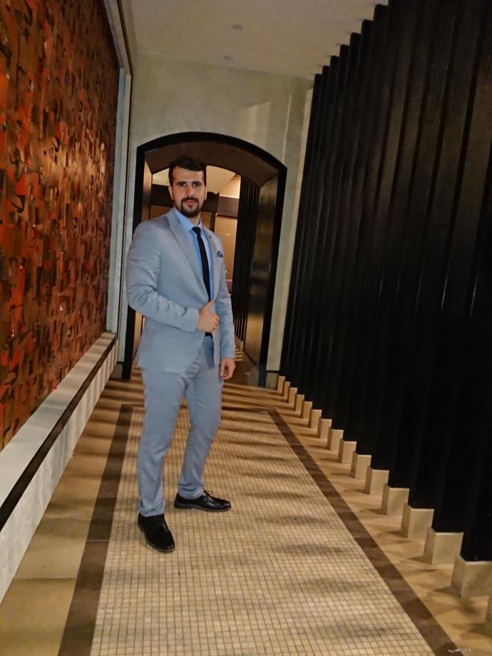 Ladies, what's so sexy about a man wearing a suit?
