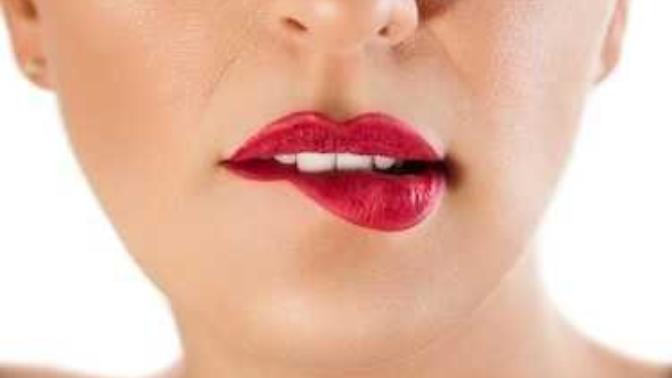 What does it mean when girls bite their lips? 😂😂😂?