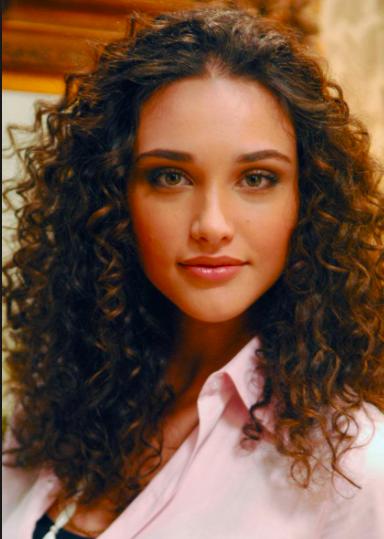 Guys: Do you think a woman is more wild or earthy if she leaves her curly hair natural?