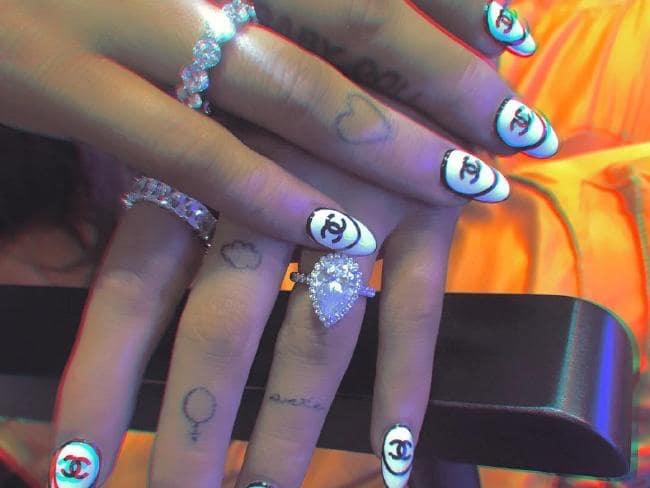 Are tattoos attractive on a girl? Particularly finger/hand tattoos?
