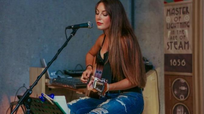 Guys, would a girl who sings catch your attention or impress you?