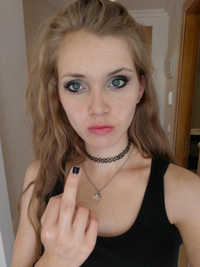 Guys, is this girl's bad girl vibe attractive to you?