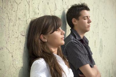 Does your crush act different with you when other people are around?