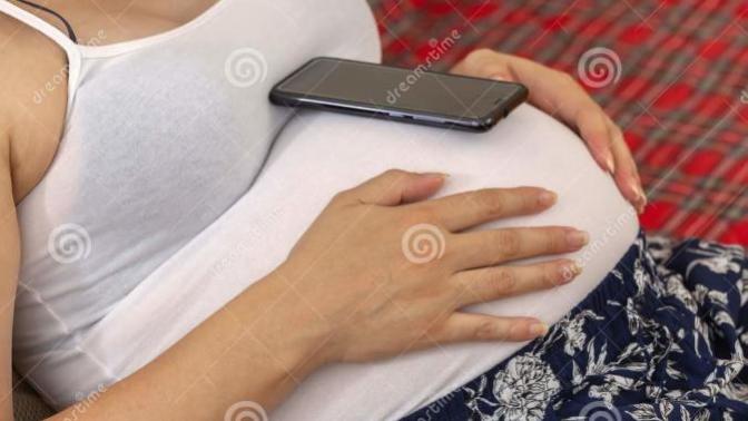 Girls, would you or have you ever used your pregnant belly to hold up your phone?