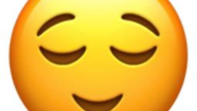 What does it mean when a guy uses a relieved face emoji when he says we have a lot in common?