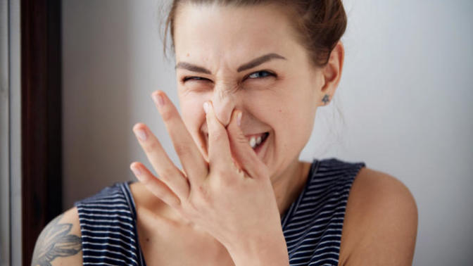 A friend of mine has bad breath. How can I tell him?