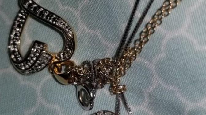 How to untangle two necklaces?