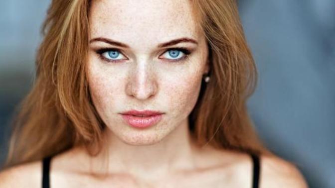 Do you think freckles and moles on somebody are unattractive?