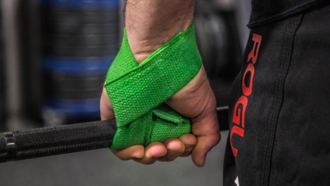 Does using lifting straps for heavy deadlifts mean your weak?