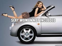 Nothing says sports car like a woman in short skirt and heels!